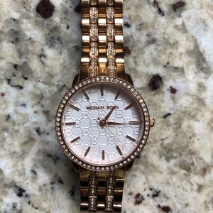 Michael Kors rose gold watch with diamonds